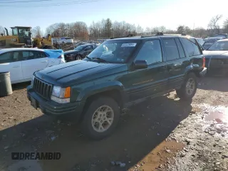1997 Jeep Grand Cherokee Limited with VIN 1J4GZ78Y2VC728605, listed as a Copart auction lot 83342804 with 104,185 mi miles and Salvage Title. Bid and sale history available at carsss.com. Image 1.