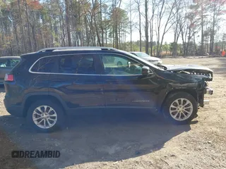 2019 Jeep Cherokee Latitude with VIN 1C4PJLCB6KD490529, listed as a IAAI auction lot 41890940 with 113,147 mi miles. Bid and sale history available at carsss.com. Image 13.