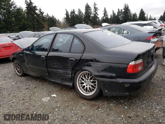 2001 BMW 5 Series 530iA with VIN WBADT63421CF05077, listed as a Copart auction lot 87458184 with 208,351 mi miles and Salvage Title. Bid and sale history available at carsss.com. Image 2.