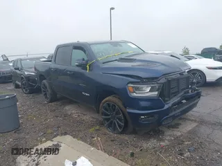 2023 Ram 1500 Laramie with VIN 1C6SRFJT9PN542437, listed as a IAAI auction lot 42256410 with 5 mi miles and . Bid and sale history available at DreamBid. Image 1.