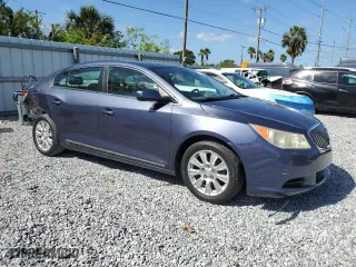 2013 Buick LaCrosse with VIN 1G4GA5ER6DF255587, listed as a Copart auction lot 51775185 with 57,572 mi miles and Salvage Title. Bid and sale history available at carsss.com. Image 4.