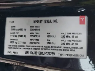 2018 Tesla Model 3 Long Range Battery with VIN 5YJ3E1EB1JF127289, listed as a IAAI auction lot 41484253 with 60,577 mi miles and . Bid and sale history available at DreamBid. Image 9.