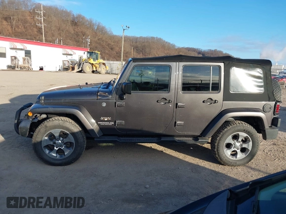 2017 Jeep Wrangler Unlimited Sahara with VIN 1C4BJWEG9HL507908, listed as a IAAI auction lot 41880209 with 99,773 mi miles. Bid and sale history available at carsss.com. Image 14.
