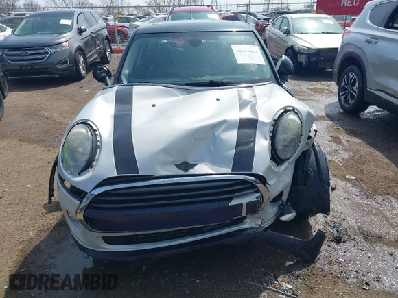 2016 MINI Hardtop 4 Door z VIN WMWXU1C54G2A93779, wystawiony jako IAAI lot #41933339 z przebiegiem 85 000 mil mil oraz . Historia ofert i sprzedaży dostępna na DreamBid. Obrazek 12.