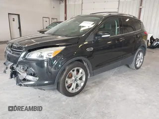 2014 Ford Escape Titanium с VIN 1FMCU0J9XEUA90770, выставлен на аукционе IAAI как лот 42354947 с пробегом 96 296 миль миль и . История ставок и продаж доступна на DreamBid. Изображение 2.