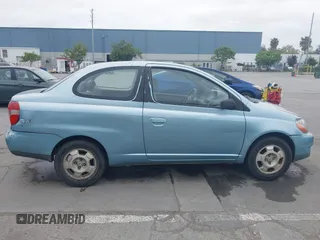 2000 Toyota ECHO z VIN JTDAT1237Y0048597, wystawiony jako IAAI lot #42120794 z przebiegiem 182 312 mil mil oraz . Historia ofert i sprzedaży dostępna na DreamBid. Obrazek 13.