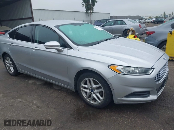 2016 Ford Fusion SE z VIN 3FA6P0H76GR385328, wystawiony jako IAAI lot #42408631 z przebiegiem 127 293 mil mil oraz . Historia ofert i sprzedaży dostępna na DreamBid. Obrazek 1.