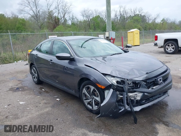 2019 Honda Civic LX with VIN 19XFC2F68KE007409, listed as a IAAI auction lot 41887406 with 57,147 mi miles and . Bid and sale history available at DreamBid. Image 1.