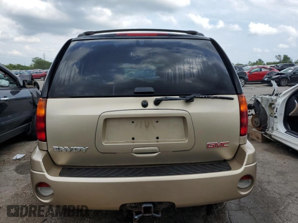 2004 GMC Envoy SLT with VIN 1GKDT13S142425057, listed as a Copart auction lot 69037524 with 231,483 mi miles and Salvage Title. Bid and sale history available at carsss.com. Image 6.
