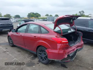 2016 Ford Focus SE with VIN 1FADP3F24GL249455, listed as a IAAI auction lot 40421121 with 49,043 mi miles. Bid and sale history available at carsss.com. Image 3.