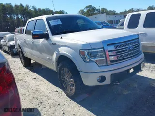 2013 Ford F-150 XL with VIN 1FTFW1ET2DFA09934, listed as a IAAI auction lot 41369848 with 191,679 mi miles. Bid and sale history available at carsss.com. Image 1.