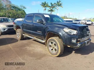 2016 Toyota Tacoma SR with VIN 3TMCZ5AN2GM005735, listed as a IAAI auction lot 42371198 with 132,351 mi miles and . Bid and sale history available at DreamBid. Image 1.