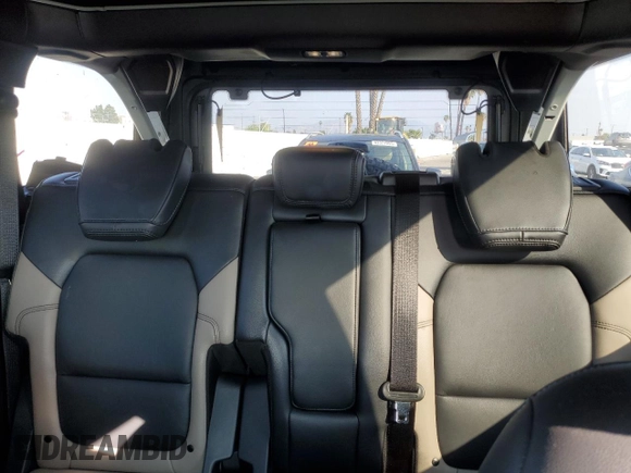 2024 Ford Bronco Wildtrak z VIN 1FMEE2BP8RLA57115, wystawiony jako Copart lot #43579085 z przebiegiem 4951 mil mil oraz Szkody całkowita. Historia ofert i sprzedaży dostępna na DreamBid. Obrazek 10.