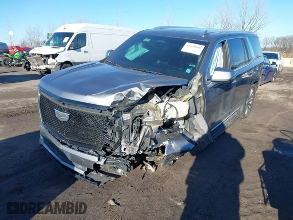 2021 Cadillac Escalade Premium Luxury z VIN 1GYS4CKL2MR231788, wystawiony jako IAAI lot #41630686 z przebiegiem 56 672 mil mil oraz . Historia ofert i sprzedaży dostępna na DreamBid. Obrazek 19.