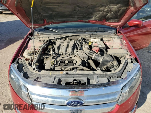 2012 Ford Fusion SEL z VIN 3FAHP0JG8CR435577, wystawiony jako Copart lot #79741724 z przebiegiem 145 023 mil mil oraz Szkoda całkowita • Salvage title. Historia ofert i sprzedaży dostępna na DreamBid. Obrazek 11.