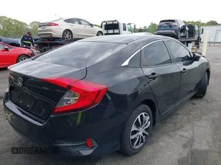 2016 Honda Civic Sedan LX with VIN 19XFC2F58GE098941, listed as a IAAI auction lot 42027734 with 155,677 mi miles. Bid and sale history available at carsss.com. Image 4.