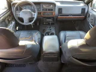 1997 Jeep Grand Cherokee TSi with VIN 1J4FX58S4VC516340, listed as a Copart auction lot 84409044 with 256,300 mi miles and Clean Title. Bid and sale history available at carsss.com. Image 8.