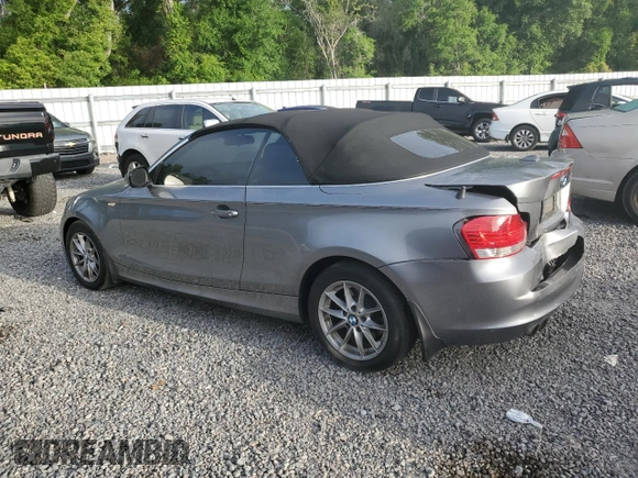 2011 BMW 1 Series 128i with VIN WBAUN1C58BVH83221, listed as a Copart auction lot 51919215 with 0 mi miles and Salvage Title. Bid and sale history available at carsss.com. Image 2.