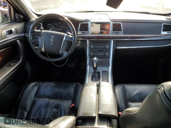 2012 Lincoln MKS с VIN 1LNHL9ER6CG804784, выставлен на аукционе Copart как лот 89372635 с пробегом 173 533 миль миль и Списание • Salvage title. История ставок и продаж доступна на DreamBid. Изображение 8.