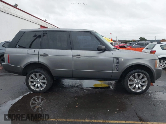 2007 Land Rover Range Rover SC z VIN SALMF13427A261552, wystawiony jako IAAI lot #40930292 z przebiegiem 143 865 mil mil oraz . Historia ofert i sprzedaży dostępna na DreamBid. Obrazek 13.
