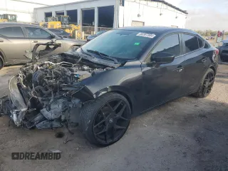 2015 Mazda 3 i Grand Touring with VIN JM1BM1W70F1222385, listed as a Copart auction lot 84387384 with 133,871 mi miles and Salvage title. Bid and sale history available at DreamBid. Image 1.
