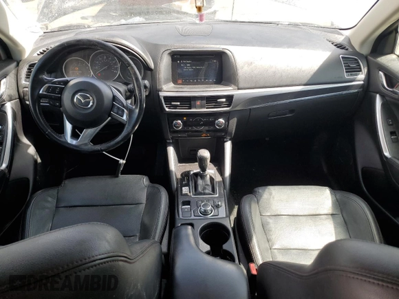 2016 Mazda CX-5 Grand Touring with VIN JM3KE4DYXG0730145, listed as a Copart auction lot 51666535 with 117,677 mi miles and Salvage Title. Bid and sale history available at carsss.com. Image 8.