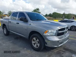 2023 Ram 1500 SLT z VIN 1C6RR7LGXPS516872, wystawiony jako IAAI lot #41951522 z przebiegiem 51 717 mil mil oraz . Historia ofert i sprzedaży dostępna na DreamBid. Obrazek 1.