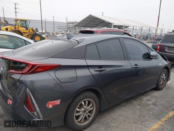 2018 Toyota Prius Plus with VIN JTDKARFP5J3095377, listed as a IAAI auction lot 42153552 with 77,255 mi miles and . Bid and sale history available at DreamBid. Image 14.