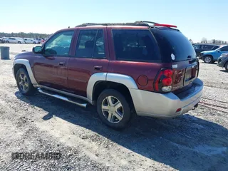 2006 Chevrolet TrailBlazer LT with VIN 1GNES13M262161488, listed as a IAAI auction lot 41774799 with 214,132 mi miles. Bid and sale history available at carsss.com. Image 3.
