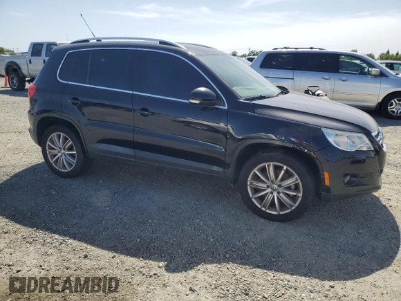 2011 Volkswagen Tiguan SEL w/Premium Navi with VIN WVGAV7AX2BW550158, listed as a Copart auction lot 57649235 with 133,346 mi miles and Clean title. Bid and sale history available at DreamBid. Image 4.