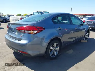 2018 Kia Forte LX with VIN 3KPFL4A77JE220538, listed as a IAAI auction lot 42095964 with 98,977 mi miles and . Bid and sale history available at DreamBid. Image 4.