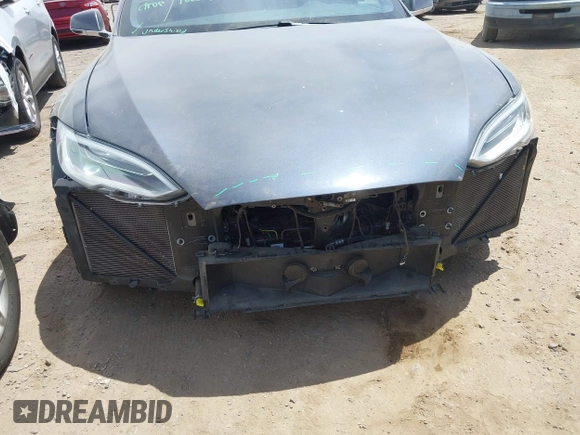 2018 Tesla Model S 75D with VIN 5YJSA1E43JF260547, listed as a IAAI auction lot 42346240 with 89,637 mi miles and . Bid and sale history available at DreamBid. Image 6.