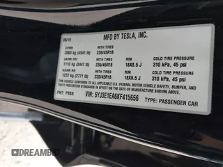 2019 Tesla Model 3 Mid Range with VIN 5YJ3E1EA6KF415656, listed as a IAAI auction lot 42140763 with 71,408 mi miles and . Bid and sale history available at carsss.com. Image 9.