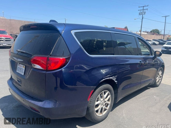 2019 Chrysler Pacifica Touring with VIN 2C4RC1DG7KR556147, listed as a IAAI auction lot 42599780 with 79,092 mi miles and . Bid and sale history available at DreamBid. Image 12.
