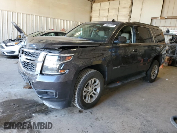 2015 Chevrolet Tahoe LS with VIN 1GNSCAKC5FR501801, listed as a Copart auction lot 50850645 with 112,896 mi miles and Salvage title. Bid and sale history available at DreamBid. Image 1.