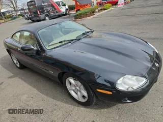 1997 Jaguar XK with VIN SAJGX5747VC007213, listed as a Copart auction lot 45953175 with 82,461 mi miles and Clean Title. Bid and sale history available at DreamBid. Image 1.