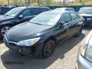 2015 Toyota Camry LE z VIN 4T1BD1FK7FU159767, wystawiony jako IAAI lot #42175153 z przebiegiem Nie podano mil oraz . Historia ofert i sprzedaży dostępna na DreamBid. Obrazek 17.