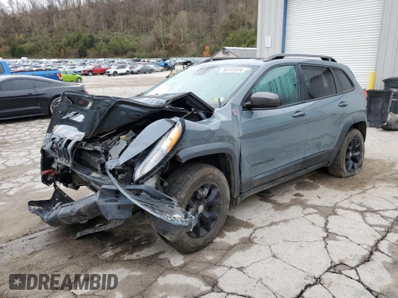 2014 Jeep Cherokee Trailhawk z VIN 1C4PJMBS1EW284275, wystawiony jako Copart lot #80191034 z przebiegiem 105 398 mil mil oraz Szkoda całkowita • Salvage title. Historia ofert i sprzedaży dostępna na DreamBid. Obrazek 1.