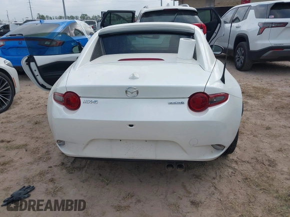 2021 Mazda MX-5 Miata Grand Touring with VIN JM1NDAM71M0454514, listed as a IAAI auction lot 41940252 with Not provided miles and . Bid and sale history available at DreamBid. Image 16.
