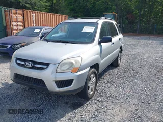 2009 Kia Sportage LX with VIN KNDJF724097567972, listed as a IAAI auction lot 42101204 with 221,299 mi miles. Bid and sale history available at carsss.com. Image 2.