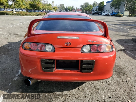 1995 Toyota Supra с VIN JZA800030605, выставлен на аукционе Copart как лот 82335644 с пробегом 154 190 миль миль и Списание • Salvage title. История ставок и продаж доступна на DreamBid. Изображение 6.