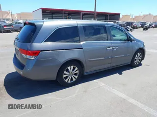 2014 Honda Odyssey EX-L with VIN 5FNRL5H69EB018557, listed as a IAAI auction lot 42855051 with 165,081 mi miles and . Bid and sale history available at DreamBid. Image 4.