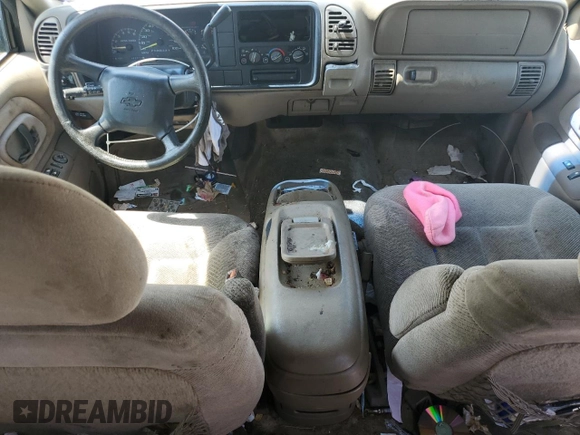 1999 Chevrolet Suburban with VIN 3GNEC16R6XG205408, listed as a Copart auction lot 57169415 with 303,412 mi miles and Salvage title. Bid and sale history available at DreamBid. Image 8.