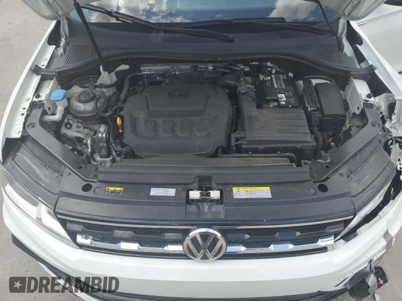 2021 Volkswagen Tiguan SE z VIN 3VV3B7AX5MM136155, wystawiony jako Copart lot #56120395 z przebiegiem 59 421 mil mil oraz Szkoda całkowita • Salvage title. Historia ofert i sprzedaży dostępna na DreamBid. Obrazek 12.
