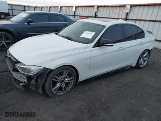 2014 BMW 3 Series 335i xDrive with VIN WBA3B9C56EF588393, listed as a IAAI auction lot 41383156 with 177,143 mi miles. Bid and sale history available at carsss.com. Image 2.