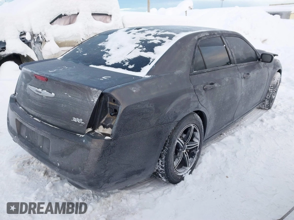 2014 Chrysler 300 with VIN 2C3CCAGG9EH297337, listed as a IAAI auction lot 41268387 with 104,542 mi miles. Bid and sale history available at carsss.com. Image 4.