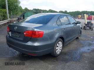 2013 Volkswagen Jetta S with VIN 3VW1K7AJ9DM261013, listed as a IAAI auction lot 42268412 with 131,486 mi miles and . Bid and sale history available at DreamBid. Image 4.