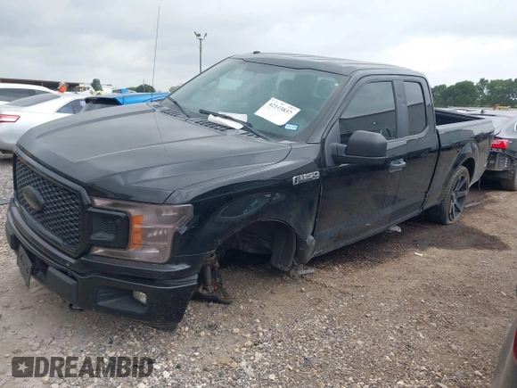 2018 Ford F-150 XL with VIN 1FTEX1EP1JKC22405, listed as a IAAI auction lot 42143837 with 111,597 mi miles and . Bid and sale history available at DreamBid. Image 18.