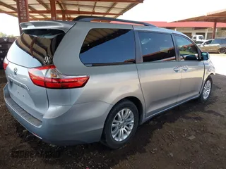 2016 Toyota Sienna XLE with VIN 5TDYK3DCXGS751231, listed as a IAAI auction lot 41975167 with 135,266 mi miles. Bid and sale history available at carsss.com. Image 4.