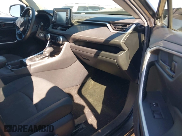 2019 Toyota RAV4 LE with VIN JTMG1RFV3KD025974, listed as a IAAI auction lot 41879264 with 131,933 mi miles and . Bid and sale history available at DreamBid. Image 5.